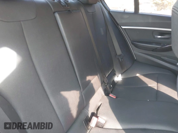 2018 BMW 3 Series 330i xDrive with VIN WBA8D9G55JNU67347, listed as a IAAI auction lot 40597140 with 68,557 mi miles. Bid and sale history available at carsss.com. Image 8.
