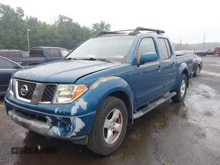 2005 Nissan Frontier LE with VIN 1N6AD07W55C438180, listed as a IAAI auction lot 42611550 with 166,700 mi miles and . Bid and sale history available at DreamBid. Image 2.