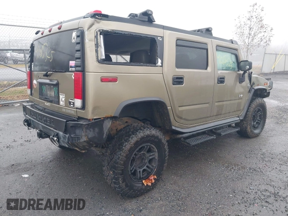 2005 Hummer H2 SUV with VIN 5GRGN23U35H130615, listed as a IAAI auction lot 41085325 with 138,393 mi miles. Bid and sale history available at carsss.com. Image 4.