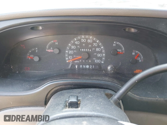 2002 Ford Econoline Cargo with VIN 1FTRE142X2HA67221, listed as a IAAI auction lot 42079493 with 180,324 mi miles. Bid and sale history available at carsss.com. Image 7.