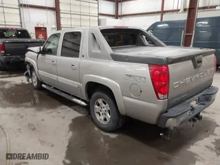 2005 Chevrolet Avalanche Z71 with VIN 3GNEK12Z55G253357, listed as a IAAI auction lot 41425074 with 203,933 mi miles. Bid and sale history available at carsss.com. Image 3.