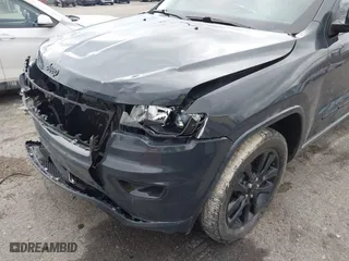 2018 Jeep Grand Cherokee Laredo E with VIN 1C4RJFAG0JC267822, listed as a IAAI auction lot 40876905 with 136,491 mi miles. Bid and sale history available at carsss.com. Image 16.