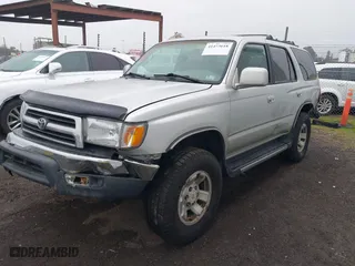 1999 Toyota 4Runner SR5 with VIN JT3HN86RXX0232435, listed as a IAAI auction lot 41473618 with 267,054 mi miles. Bid and sale history available at carsss.com. Image 18.