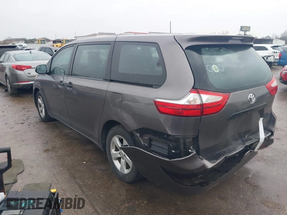 2015 Toyota Sienna L with VIN 5TDZK3DC9FS563593, listed as a IAAI auction lot 41466419 with 136,394 mi miles and . Bid and sale history available at DreamBid. Image 3.