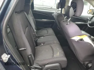 2013 Dodge Journey American Value with VIN 3C4PDCAB6DT577273, listed as a Copart auction lot 50627295 with 139,775 mi miles and Salvage title. Bid and sale history available at DreamBid. Image 12.