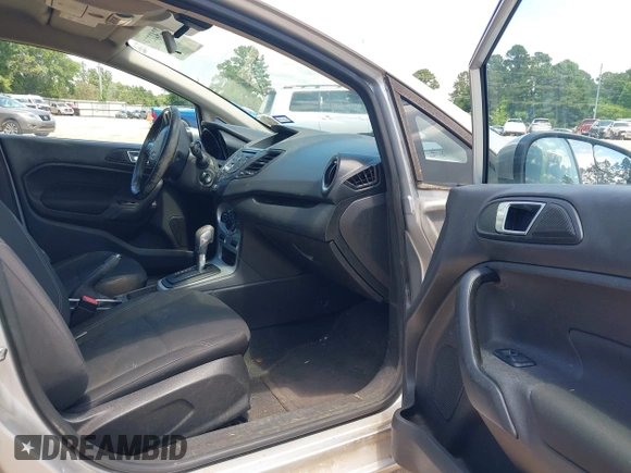 2016 Ford Fiesta SE with VIN 3FADP4EJ7GM121143, listed as a IAAI auction lot 42242739 with 142,351 mi miles and . Bid and sale history available at carsss.com. Image 5.