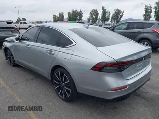 2024 Honda Accord Touring z VIN 1HGCY2F87RA082705, wystawiony jako IAAI lot #42194619 z przebiegiem 7 896 mil mil oraz . Historia ofert i sprzedaży dostępna na DreamBid. Obrazek 3.