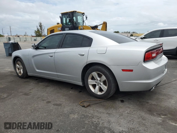 2012 Dodge Charger SE with VIN 2C3CDXBG4CH203207, listed as a Copart auction lot 56910395 with 156,016 mi miles and Salvage Title. Bid and sale history available at DreamBid. Image 2.