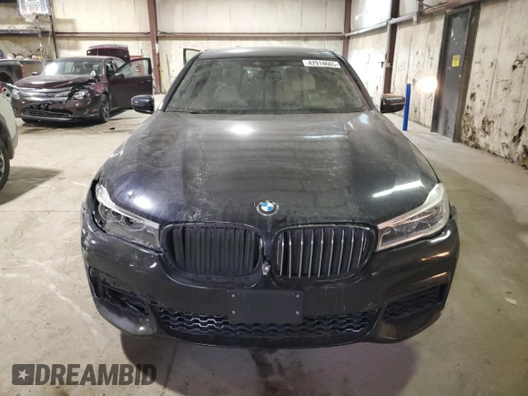 2017 BMW 7 Series with VIN WBA7F2C34HG423291, listed as a Copart auction lot 42914665 with 61,113 mi miles and Salvage Title. Bid and sale history available at DreamBid. Image 5.