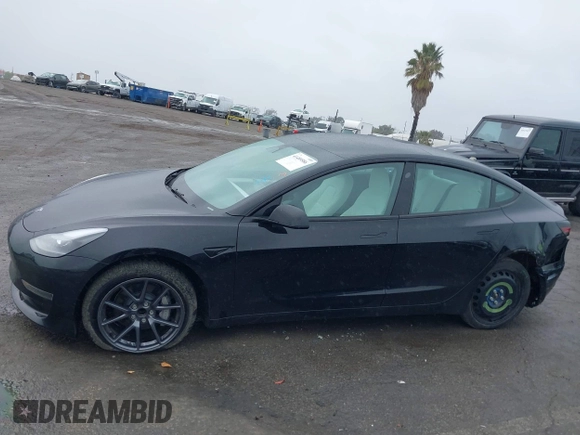 2023 Tesla Model 3 with VIN 5YJ3E1EA0PF587656, listed as a IAAI auction lot 41489586 with 12,844 mi miles and . Bid and sale history available at DreamBid. Image 15.