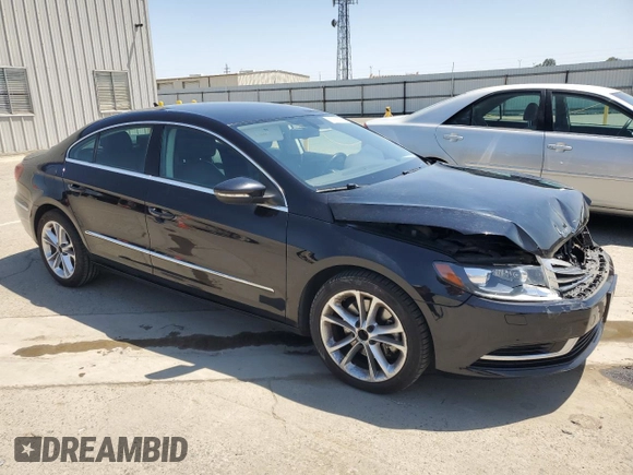 2016 Volkswagen CC Sport with VIN WVWBP7AN6GE513628, listed as a Copart auction lot 57667775 with 122,302 mi miles and Salvage title. Bid and sale history available at DreamBid. Image 4.