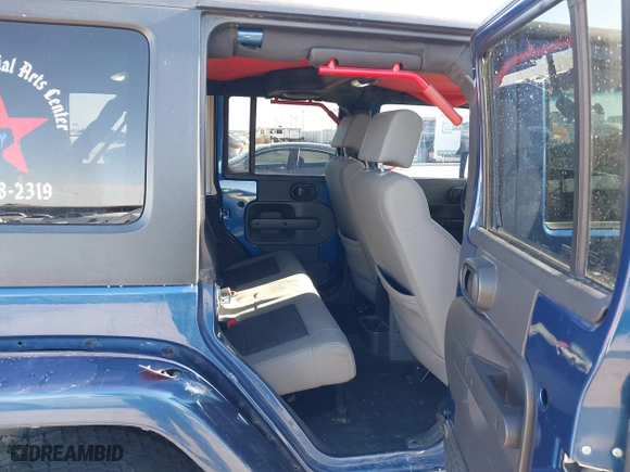 2010 Jeep Wrangler Unlimited Sport with VIN 1J4BA3H18AL105500, listed as a IAAI auction lot 41634465 with 230,453 mi miles. Bid and sale history available at carsss.com. Image 8.