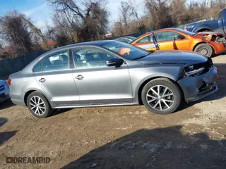 2017 Volkswagen Jetta 1.4T SE with VIN 3VWDB7AJ6HM371875, listed as a IAAI auction lot 41653366 with 151,868 mi miles. Bid and sale history available at carsss.com. Image 14.