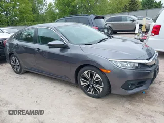 2018 Honda Civic EX-L z VIN 19XFC1F79JE003290, wystawiony jako IAAI lot #42187362 z przebiegiem 81 403 mil mil oraz . Historia ofert i sprzedaży dostępna na DreamBid. Obrazek 1.