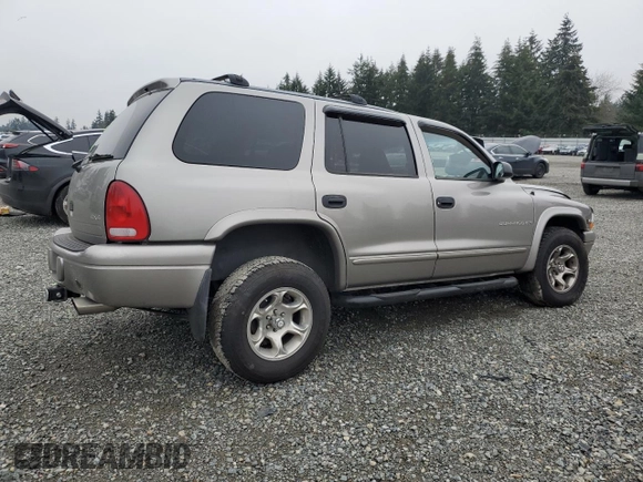 2000 Dodge Durango with VIN 1B4HS28Z6YF121861, listed as a Copart auction lot 87669175 with 115,990 mi miles and Salvage Title. Bid and sale history available at DreamBid. Image 3.