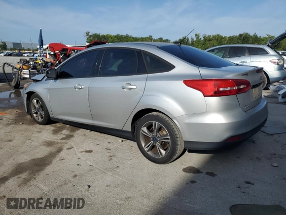 2017 Ford Focus SE with VIN 1FADP3FE9HL273889, listed as a Copart auction lot 53737055 with 114,700 mi miles and Salvage Title. Bid and sale history available at DreamBid. Image 2.
