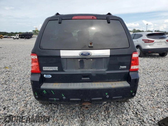 2010 Ford Escape Limited with VIN 1FMCU0EG2AKD40114, listed as a Copart auction lot 63455025 with 120,112 mi miles and Salvage title. Bid and sale history available at DreamBid. Image 6.