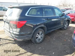 2016 Honda Pilot EX-L with VIN 5FNYF6H77GB108567, listed as a IAAI auction lot 41704962 with 193,873 mi miles. Bid and sale history available at carsss.com. Image 4.