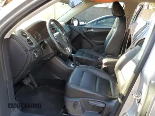 2013 Volkswagen Tiguan S with VIN WVGAV7AX8DW501081, listed as a Copart auction lot 88065365 with 157,312 mi miles and Salvage title. Bid and sale history available at DreamBid. Image 7.