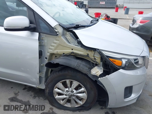 2015 Kia Sedona L with VIN KNDMA5C16F6027418, listed as a IAAI auction lot 42129259 with 78,097 mi miles. Bid and sale history available at carsss.com. Image 6.