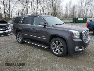 2015 GMC Yukon Denali with VIN 1GKS2CKJ7FR565008, listed as a Copart auction lot 48765355 with 191,606 mi miles and Clean Title. Bid and sale history available at carsss.com. Image 4.