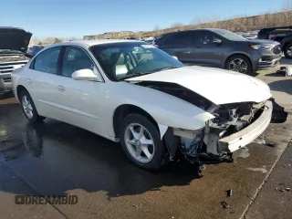 2001 Oldsmobile Aurora z VIN 1G3GR64HX14120650, wystawiony jako Copart lot #86421344 z przebiegiem 91 452 mil mil oraz Szkody całkowita. Historia ofert i sprzedaży dostępna na DreamBid. Obrazek 4.