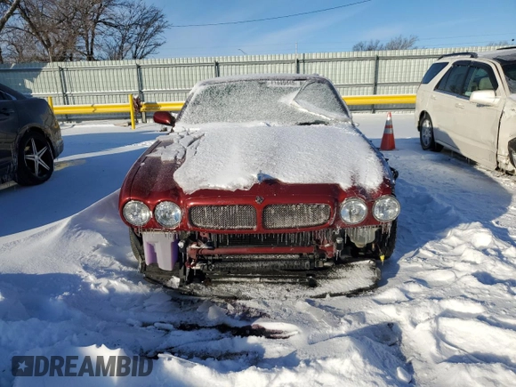 1999 Jaguar XJ with VIN SAJPD1841XC869913, listed as a Copart auction lot 41449445 with Not provided miles and Salvage title. Bid and sale history available at DreamBid. Image 5.