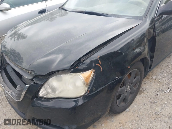 2010 Toyota Avalon XL with VIN 4T1BK3DB8AU358260, listed as a IAAI auction lot 41942640 with 230,584 mi miles and . Bid and sale history available at carsss.com. Image 6.