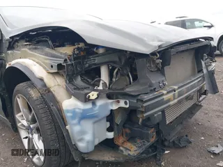 2015 Ford Fusion Titanium with VIN 3FA6P0D98FR241432, listed as a IAAI auction lot 40810097 with 94,021 mi miles. Bid and sale history available at carsss.com. Image 6.