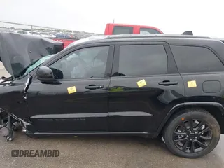 2022 Jeep Grand Cherokee Laredo X with VIN 1C4RJEAG3NC154723, listed as a IAAI auction lot 41890411 with Not provided miles and . Bid and sale history available at DreamBid. Image 14.