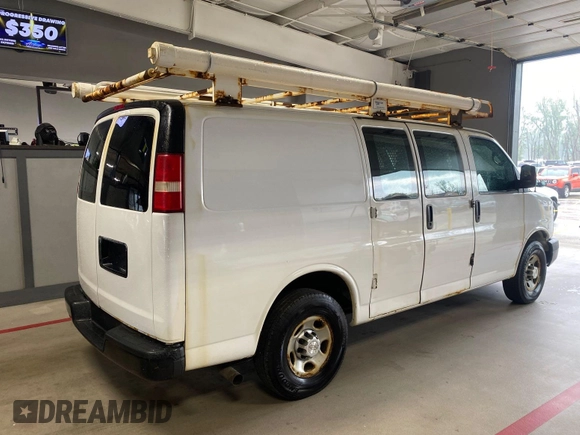 2015 Chevrolet Express Cargo with VIN 1GCWGFCG0F1145334, listed as a IAAI auction lot 42610461 with 143,162 mi miles and . Bid and sale history available at DreamBid. Image 28.