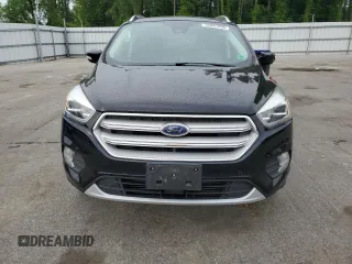 2019 Ford Escape Titanium with VIN 1FMCU0J95KUB14713, listed as a Copart auction lot 55887895 with 85,414 mi miles and Salvage title. Bid and sale history available at DreamBid. Image 5.