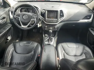 2015 Jeep Cherokee Trailhawk with VIN 1C4PJMBS0FW655167, listed as a Copart auction lot 64597165 with 193,779 mi miles and Clean title. Bid and sale history available at DreamBid. Image 8.