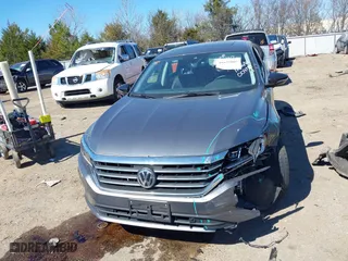 2022 Volkswagen Passat 2.0T Limited Edition with VIN 1VWBA7A33NC009785, listed as a IAAI auction lot 41639005 with 69,484 mi miles. Bid and sale history available at carsss.com. Image 12.
