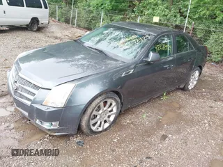 2009 Cadillac CTS AWD z VIN 1G6DT57V790133622, wystawiony jako IAAI lot #42272929 z przebiegiem 124 695 mil mil oraz . Historia ofert i sprzedaży dostępna na DreamBid. Obrazek 2.