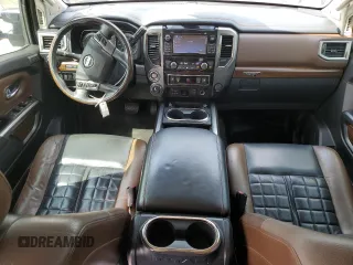 2016 Nissan Titan SL z VIN 1N6BA1F46GN513494, wystawiony jako Copart lot #55271185 z przebiegiem 97 890 mil mil oraz Tytuł czysty. Historia ofert i sprzedaży dostępna na DreamBid. Obrazek 8.