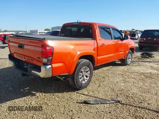 2018 Toyota Tacoma SR5 with VIN 5TFAZ5CN2JX069067, listed as a IAAI auction lot 41975459 with 92,434 mi miles and . Bid and sale history available at DreamBid. Image 4.