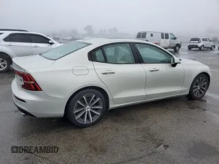 2021 Volvo S60 Momentum with VIN 7JRA22TK9MG093235, listed as a Copart auction lot 77105143 with 27,141 mi miles. Bid and sale history available at carsss.com. Image 3.