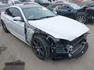2014 BMW M6 z VIN WBS6C9C51ED467255, wystawiony jako IAAI lot #42473434 z przebiegiem 68 480 mil mil oraz . Historia ofert i sprzedaży dostępna na DreamBid. Obrazek 1.