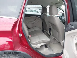 2014 Ford Escape SE with VIN 1FMCU9GX7EUC35483, listed as a IAAI auction lot 41704298 with 105,017 mi miles. Bid and sale history available at carsss.com. Image 8.