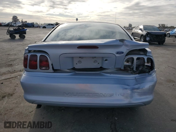1996 Ford Mustang with VIN 1FALP4047TF106715, listed as a Copart auction lot 78658044 with 60,205 mi miles and Salvage Title. Bid and sale history available at carsss.com. Image 6.