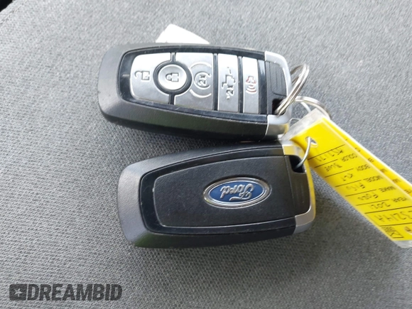 2021 Ford F-150 XL z VIN 1FTFW1E5XMFA57179, wystawiony jako IAAI lot #42561205 z przebiegiem 90 517 mil mil oraz . Historia ofert i sprzedaży dostępna na DreamBid. Obrazek 11.