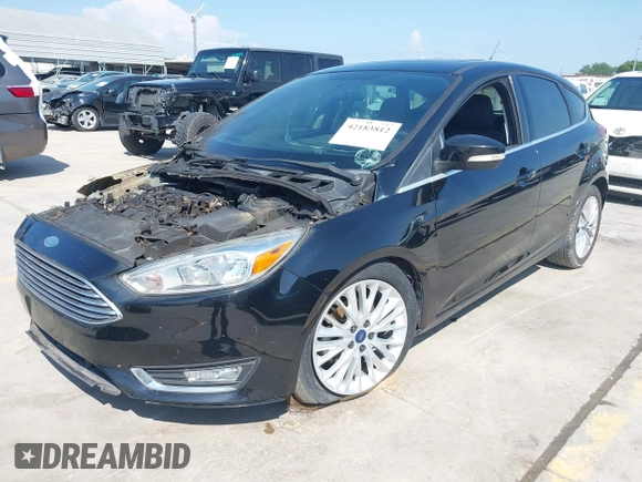 2018 Ford Focus Titanium with VIN 1FADP3N21JL289677, listed as a IAAI auction lot 42183812 with Not provided miles and . Bid and sale history available at DreamBid. Image 2.