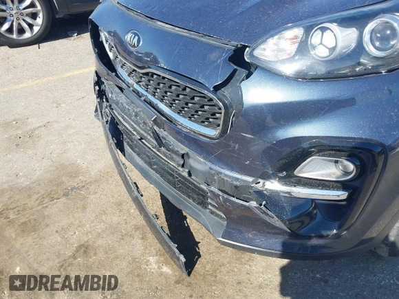 2021 Kia Sportage EX with VIN KNDPN3AC1M7889706, listed as a IAAI auction lot 41948559 with 52,329 mi miles and . Bid and sale history available at DreamBid. Image 6.