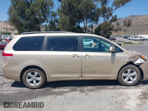 2012 Toyota Sienna LE AAS with VIN 5TDKK3DC5CS186077, listed as a IAAI auction lot 40265988 with 130,888 mi miles and . Bid and sale history available at DreamBid. Image 13.