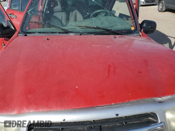 2004 Chevrolet Tracker with VIN 2CNBJ134846911647, listed as a Copart auction lot 77128924 with Not provided miles and Salvage title. Bid and sale history available at DreamBid. Image 13.