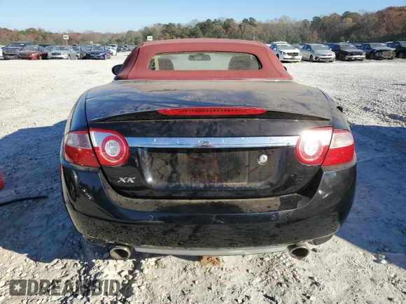 2007 Jaguar XK with VIN SAJDA44B975B00696, listed as a Copart auction lot 83102494 with Not Provided miles and Clean Title. Bid and sale history available at carsss.com. Image 6.