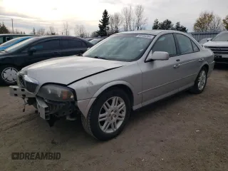 2005 Lincoln LS Sport z VIN 1LNHM87A15Y627959, wystawiony jako Copart lot #80135364 z przebiegiem 76 977 mil mil oraz Czysty tytuł • Clean title. Historia ofert i sprzedaży dostępna na DreamBid. Obrazek 1.