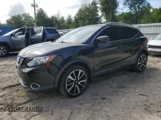 2017 Nissan Rogue SL with VIN JN1BJ1CP9HW036706, listed as a Copart auction lot 63125945 with 140,674 mi miles and Salvage title. Bid and sale history available at DreamBid. Image 1.