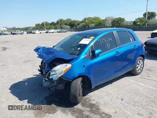 2009 Toyota Yaris with VIN JTDKT903X95257701, listed as a IAAI auction lot 41796420 with 86,953 mi miles. Bid and sale history available at carsss.com. Image 2.